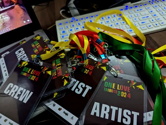 One Love Tribute 2024 crew and artist passes on coloured lanyards.